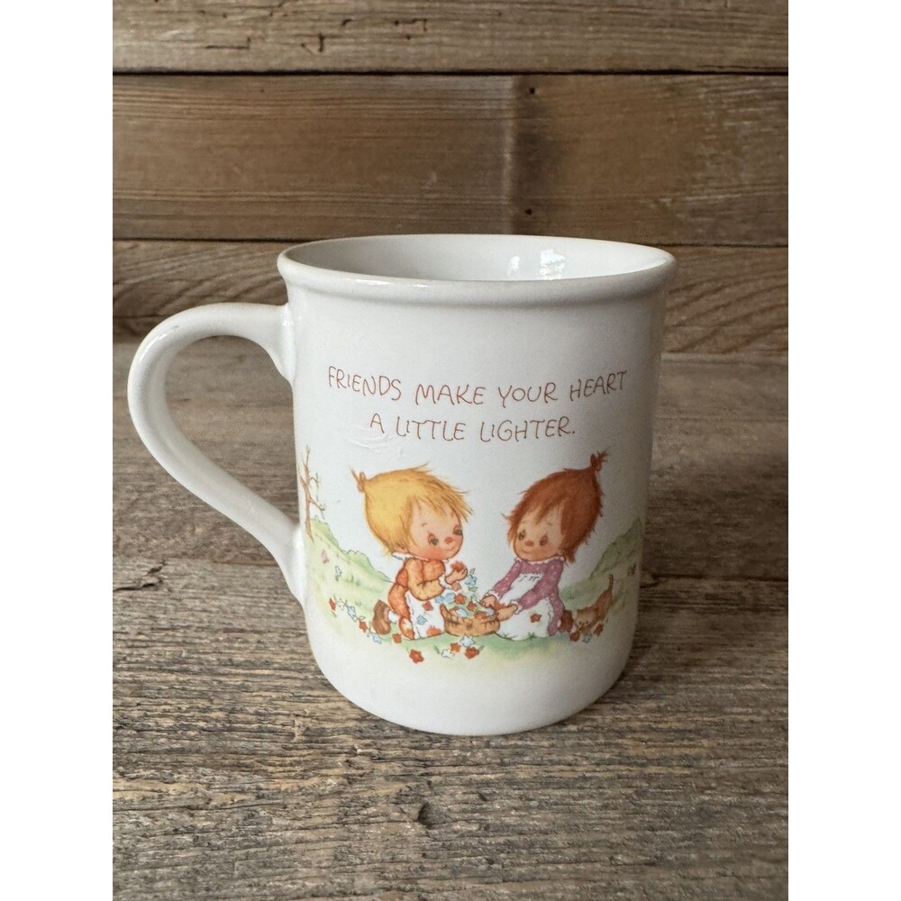 Vintage 1983 Hallmark "Mug Mates" ceramic coffee mug with design by Betsey Clark